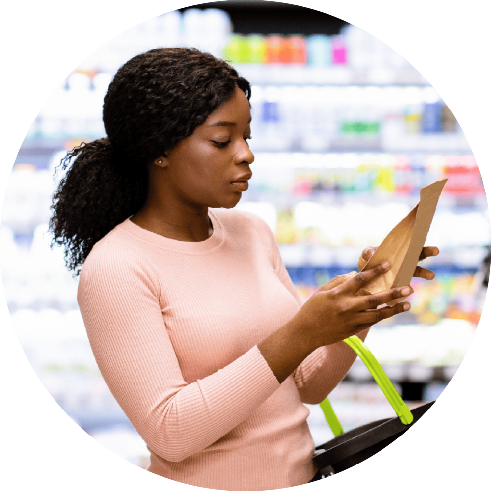 Woman looking at packaging label